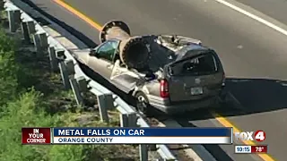 Metal object falls and crushes van in Florida