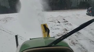 John Deere 3720 snowblowing