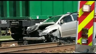 Car Mangled by Train After Trying to Beat Gates