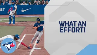 Vlad Jr. DIVES at base to save an out in incredible play!