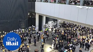 Protestors gather in Hong Kong ahead of transfer anniversary rally