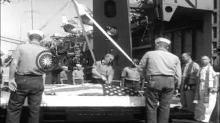 Coffins of those killed in fire aboard USS Oriskany, on October 26, 1966, are tra...HD Stock Footage