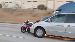 Caught On Camera: Driver Speeds Down 91 Freeway In Corona With Motorcycle Wrapped Around Bumper