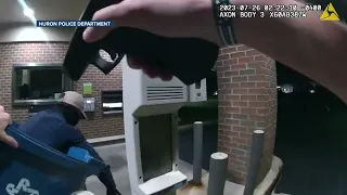 Bank robbery suspect falls into recycle bin moments before arrest