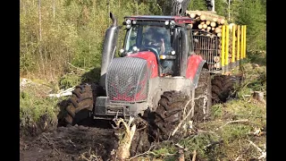 New Valtra T144  with large trailer Kronos 160 4WDM and Gripto 1010 loader logging in wet forest