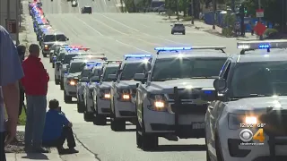 Emergency Responders And Tow Truck Drivers Join Procession For Trooper William Moden