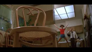 Furniture moving by itself -- Jobeth Williams and Craig T. Nelson in Poltergeist