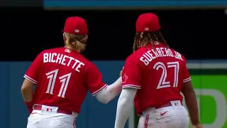 Bo Bichette and Vladimir Guerrero Jr chat after a misunderstanding on the field