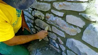 HOW TO BUILD NATURAL STONE WALL, RETAINING ROCK BOULDERS DETAIL MASONRY ADVICE TUTORIAL CONSTRUCTION