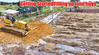 Getting Started Filling up land huge By Bulldozer Komatsu D31P And Dump Truck Unloading