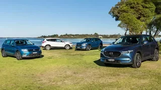 Ford Escape vs Hyundai Tucson vs Mazda CX-5 vs Volkswagen Tiguan