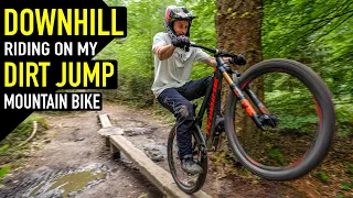 RIDING DOWNHILL TRACKS ON MY DIRT JUMP BIKE!!