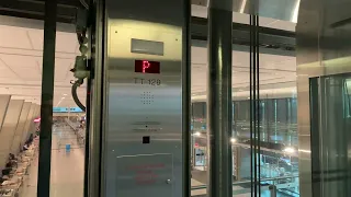 Awesome Roped Hydraulic Elevators at Montréal-Trudeau Airport (Transborder Zone)