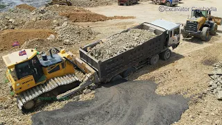 Amazing bulldozer use his power to pushing recovery dump truck stuck mud and wheel loader pulling