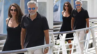 George Clooney and Amal Clooney Hold Hands as They Leave Venice After Her DVF Awards Honor.