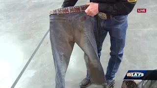 Professional bull rider shows off gear ahead of competition at KFC Yum! Center