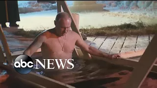 Shirtless Vladimir Putin takes dip in icy Russian lake for the Epiphany