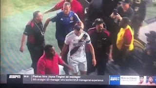 Zlatan holding his junk towards LAFC fan.