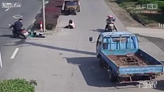 LiveLeak com   Woman riding on a scooter gets flown off after the wheel gets tangled with a rope 1