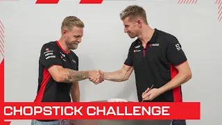 Kevin Magnussen and Nico Hulkenberg take on the Chopstick challenge