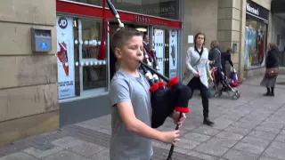 Merry Christmas From Young Scottish Bagpipers In Scotland