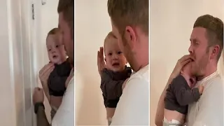 Baby cries when dad pretends to bang head on door #Shorts