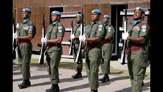Fijian guard at UN base, singing a Hymn