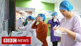 Coronavirus: Some workplaces in Wuhan to re-open - BBC News