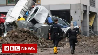 Angela Merkel shocked by 'surreal' floods devastation in Germany - BBC News