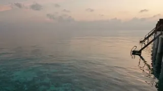 4K Beautiful sunrise from our water villa at the Emerald Maldives Resort & Spa.