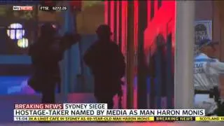 Hostages Run From Sydney Cafe