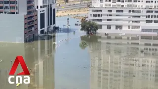 What caused the UAE's rare torrential rains?