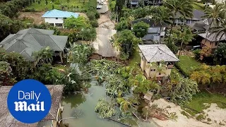 Drone footage shows damage from massive flooding in Hawaii - Daily Mail