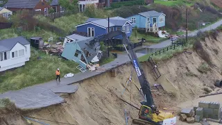 Further coastal erosion forces council  to demolish another 5 homes before Christmas.