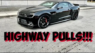 POV Driving Supercharged Camaro SS on Highway