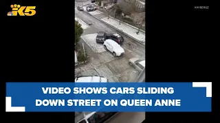 WATCH: Video shows cars sliding down street on Queen Anne in Seattle