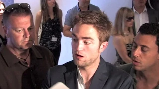 Robert Pattinson and Cosmopolis crew out of conference press room, Cannes