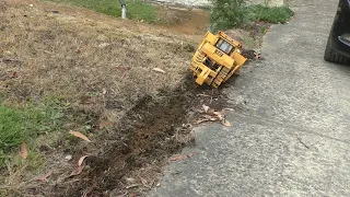 RC DX2 Dozer ripping and roll over