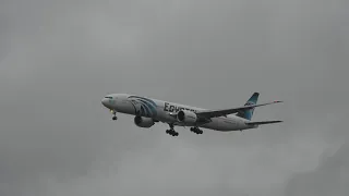 #StormCiara Egypt Air 777-300ER WET AND WINDY landing Heathrow.