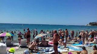 На пляже Архипо-Осиповки Люди загорают 2018 август