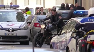 Tom Cruise dangerously rides his bike without an helmet on the movie set of MI6 in Paris.