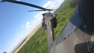 UH-60 JUST FLYING AROUND LOW AND FAST HAVING FUN (TAIL VIEW) Part 1