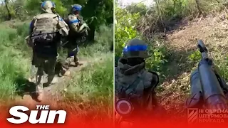 Ukrainian soldiers storm Russian positions near Bakhmut