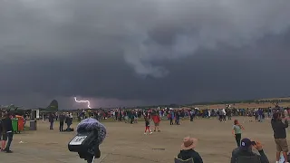 Red Arrows displaying as a thunderstorm approaches - Duxford Summer Air Show 2021