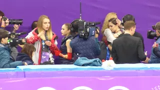 2018-02-23 Zagitova & Medvedeva hug their coaches