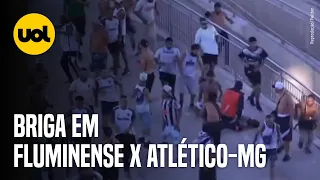 FLUMINENSE X ATLÉTICO-MG: TORCEDORES BRIGAM APÓS RETIRADA DE FAIXA DE ORGANIZADA, E HOMEM É FERIDO