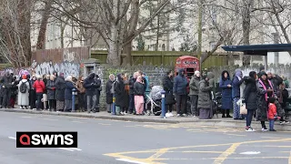 Massive queue outside new dental practice in the hope of getting NHS dental care | SWNS