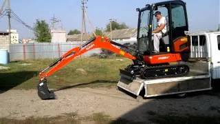 Мини-экскаватор Kubota KX019-4 разгрузка с фуры