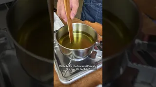 Chef deep fries a wooden spoon