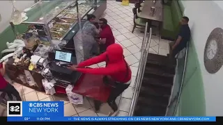 Surveillance video shows gunman opening fire inside Queens restaurant